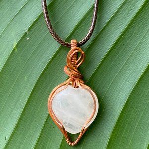 Wire wrapped rose quartz pendant